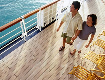 Couple strolling on a cruise ship deck