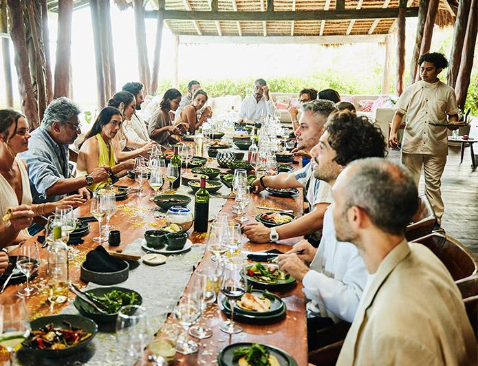 An organization enjoys dinner together