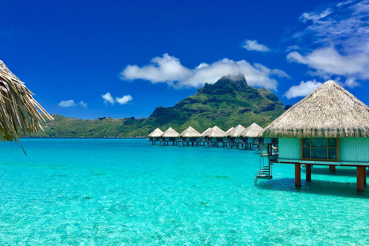 Experience over water bungalow views with South Pacific vacation packages